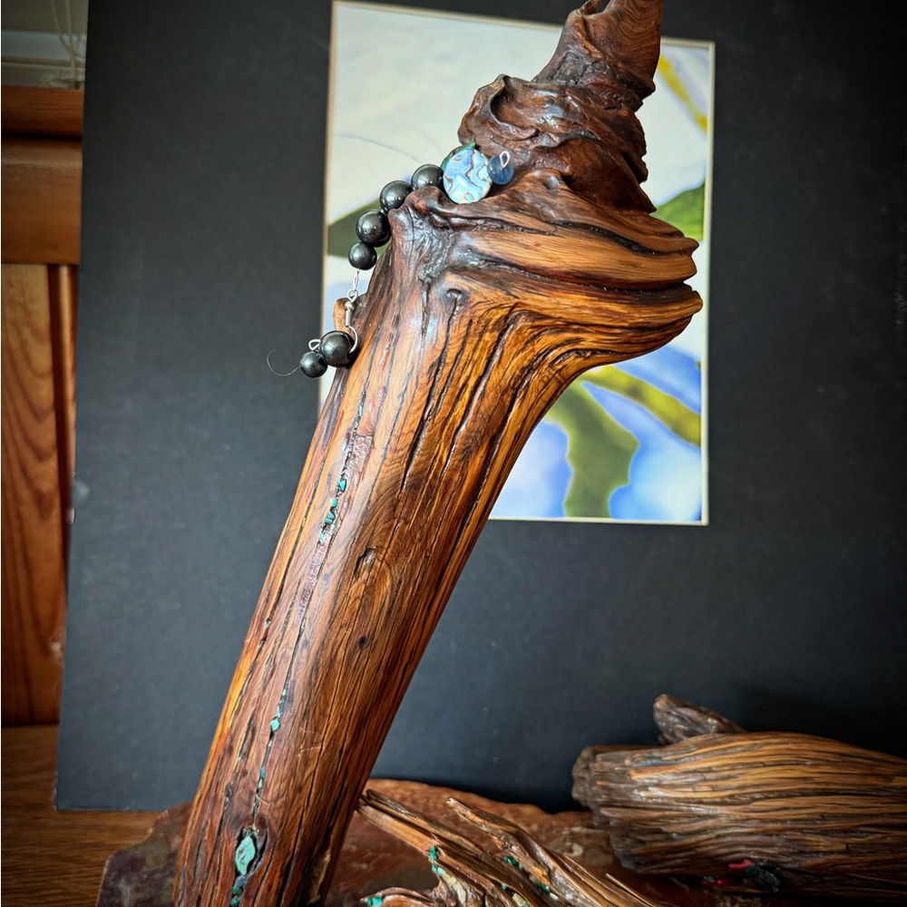 Artistic Driftwood Sculpture with Black and Brown Details